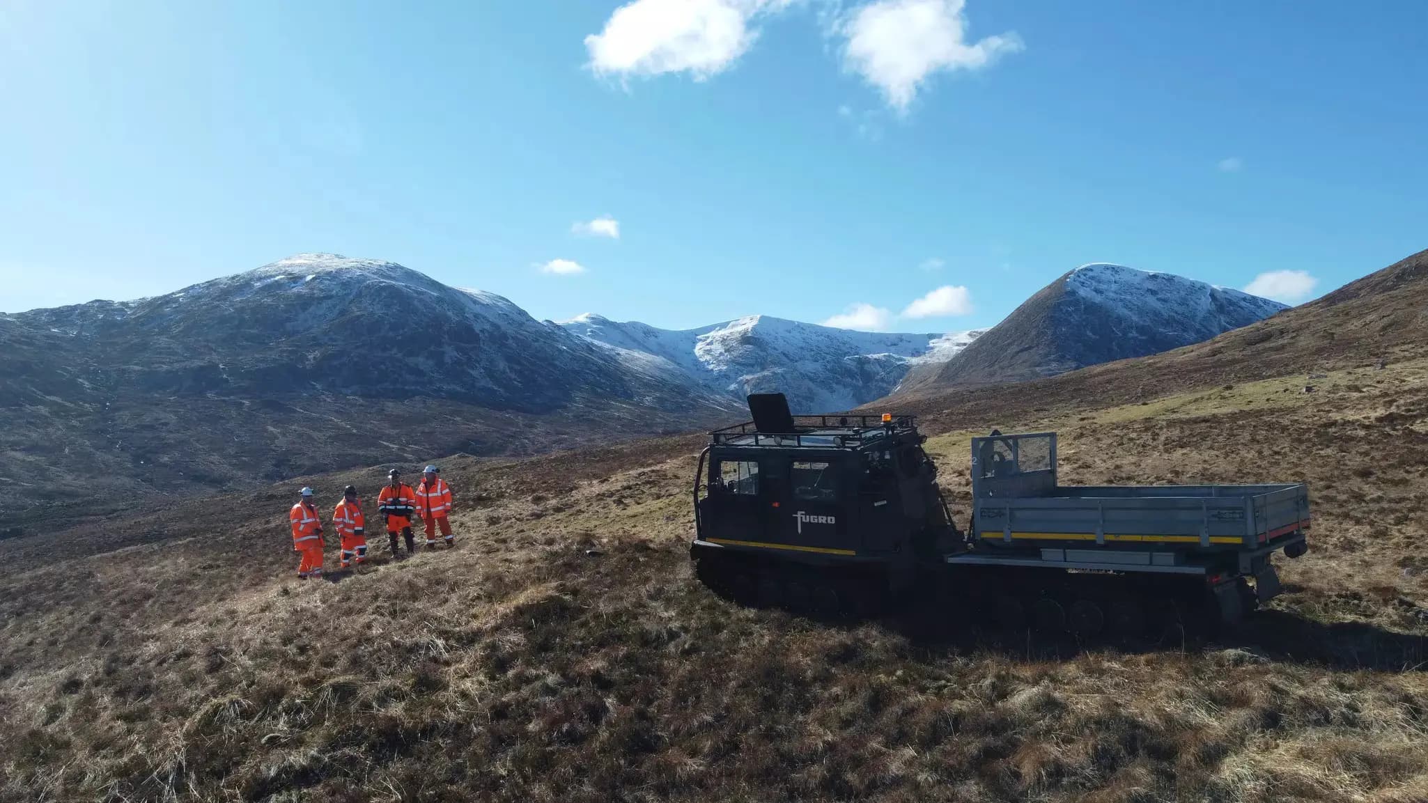 image of Fugro employees working in the field
